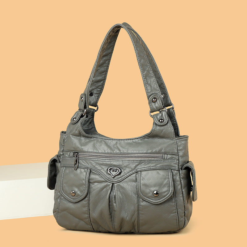 Bolsa de hombro femenina de diseño suave y funcional