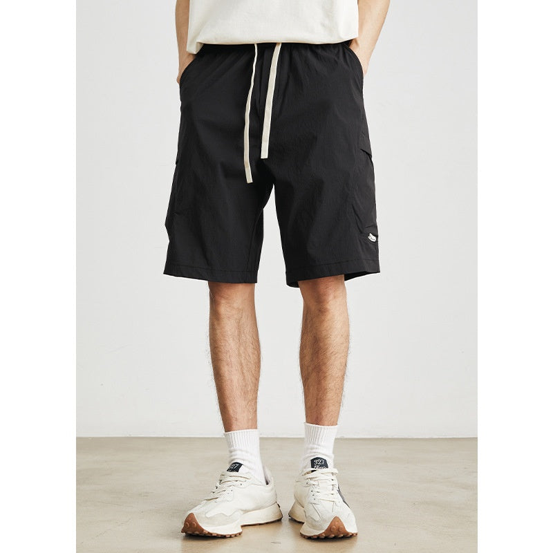 Shorts ligeros con bolsillos laterales y cordón ajustable para hombre - Calvin