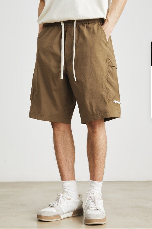 Shorts ligeros con bolsillos laterales y cordón ajustable para hombre - Calvin