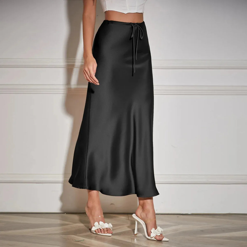 Falda de satén de talle alto con lazos, elegante y actual perfecta para un look sofisticado y moderno