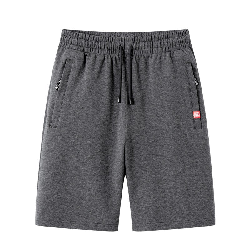 Shorts deportivos lisos con bolsillos con cierre para hombre - Kevin