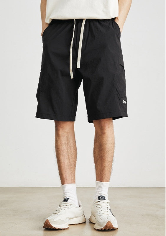 Shorts ligeros con bolsillos laterales y cordón ajustable para hombre - Calvin
