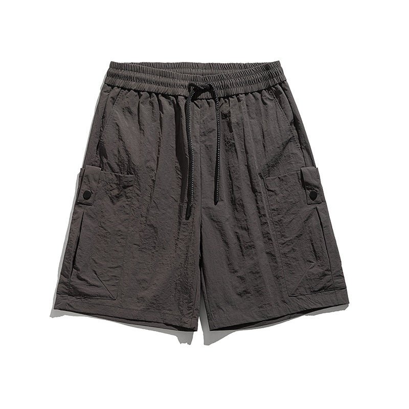 Shorts deportivos dryfit con bolsillo lateral para hombre - Orion
