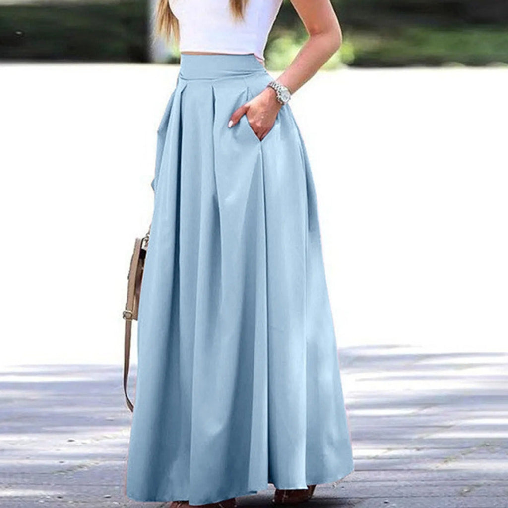 Elegante y fluida falda plisada de talle alto, ideal para un look sofisticado y femenino