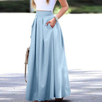 Elegante y fluida falda plisada de talle alto, ideal para un look sofisticado y femenino