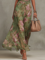 Vestido largo floral con cuello halter y cintura drapeada- Sophie